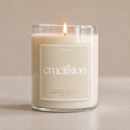 Candle with a label on a beige background