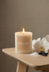 Candle labeled &