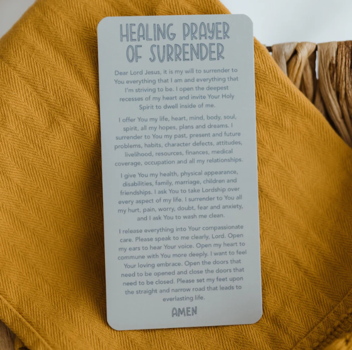 Healing prayer card on a textured fabric background