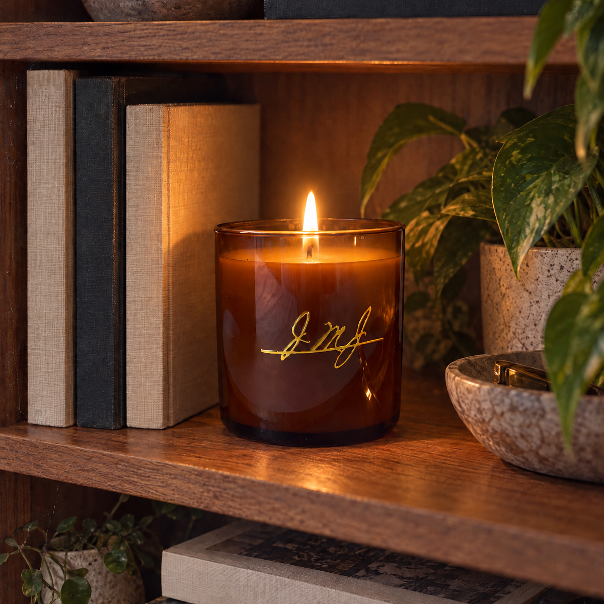amber candle on  shelf jmj