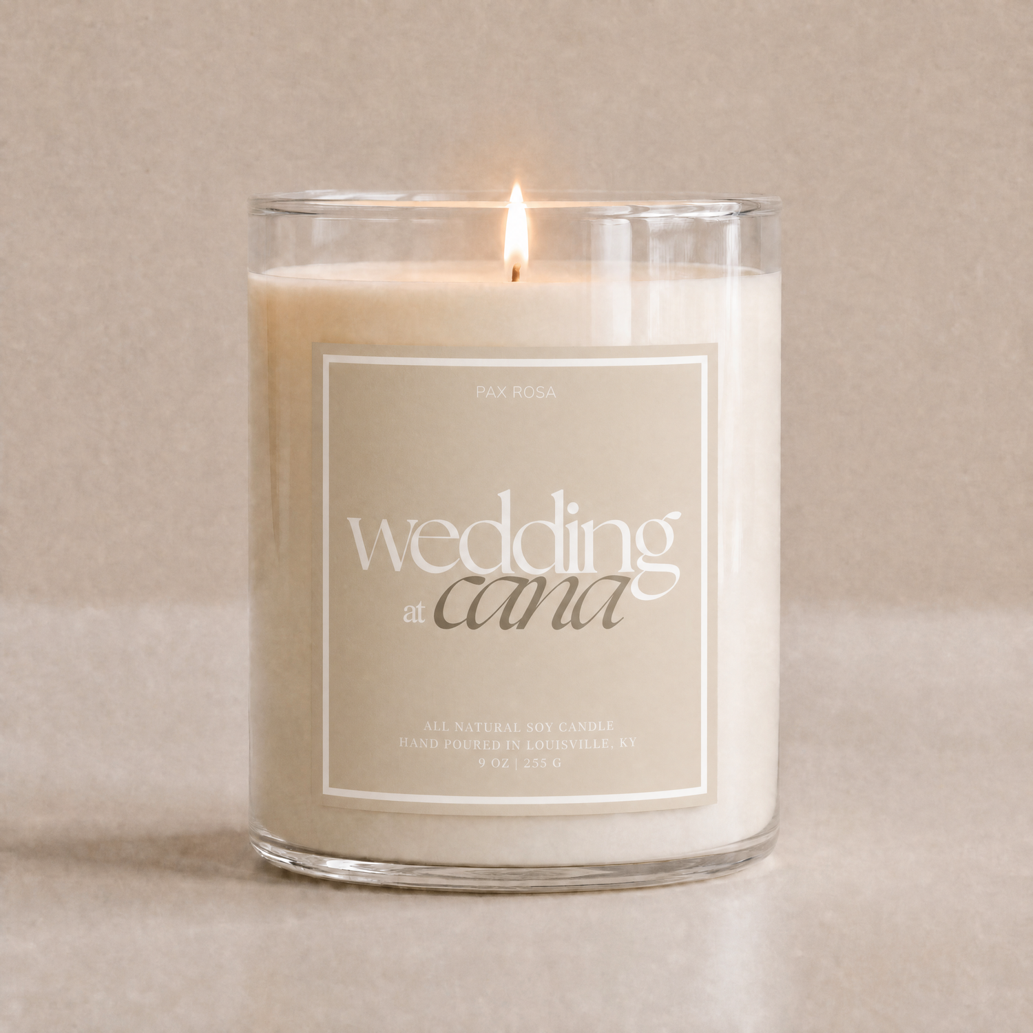 candle lit with label "wedding at cana" 