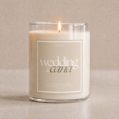 candle lit with label "wedding at cana" 